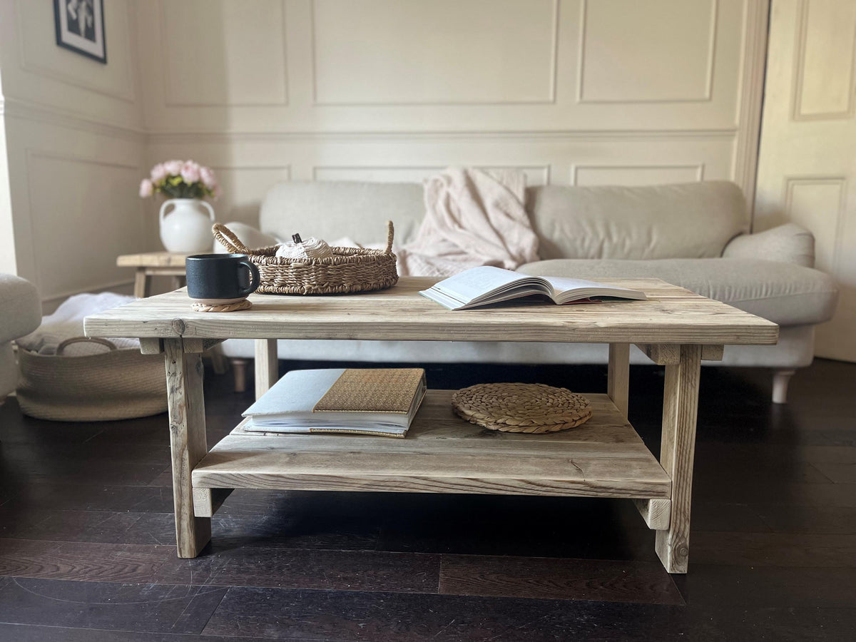 Living room with a farmhouse style wooden coffee table, front view. 