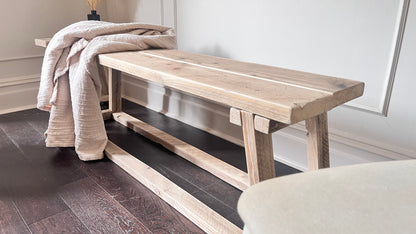 Farmhouse style wooden bench. Handmade in the UK, front view.