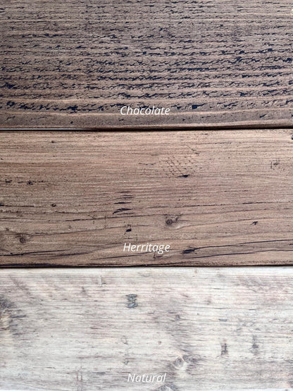 Close-up of wooden planks labeled 'Chocolate', 'Heritage', and 'Natural'.