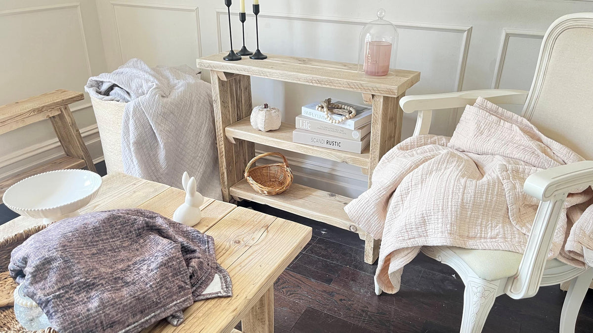 Nestled living room with wooden furniture, a shelf, and decorative items.